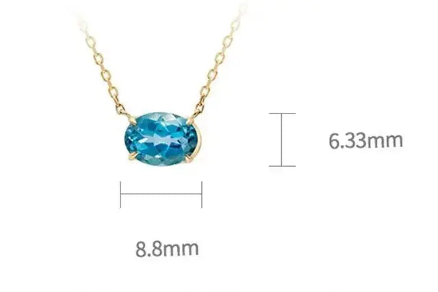 Modern Oval Blue Topaz Necklace in Solid Gold shop name