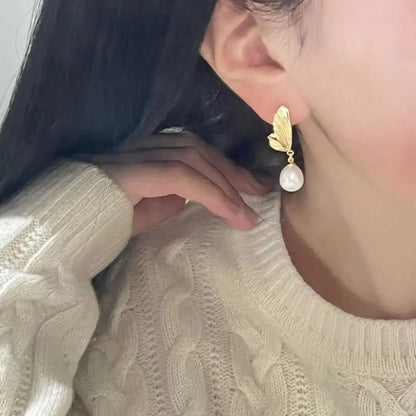 Freshwater Drop Shape Rice Pearls on Angel Wings