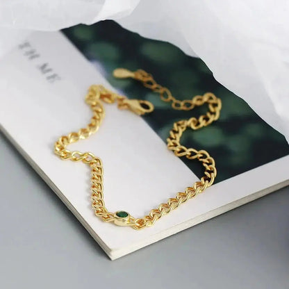 Cuban Chain Emerald Accent Bracelet shop name