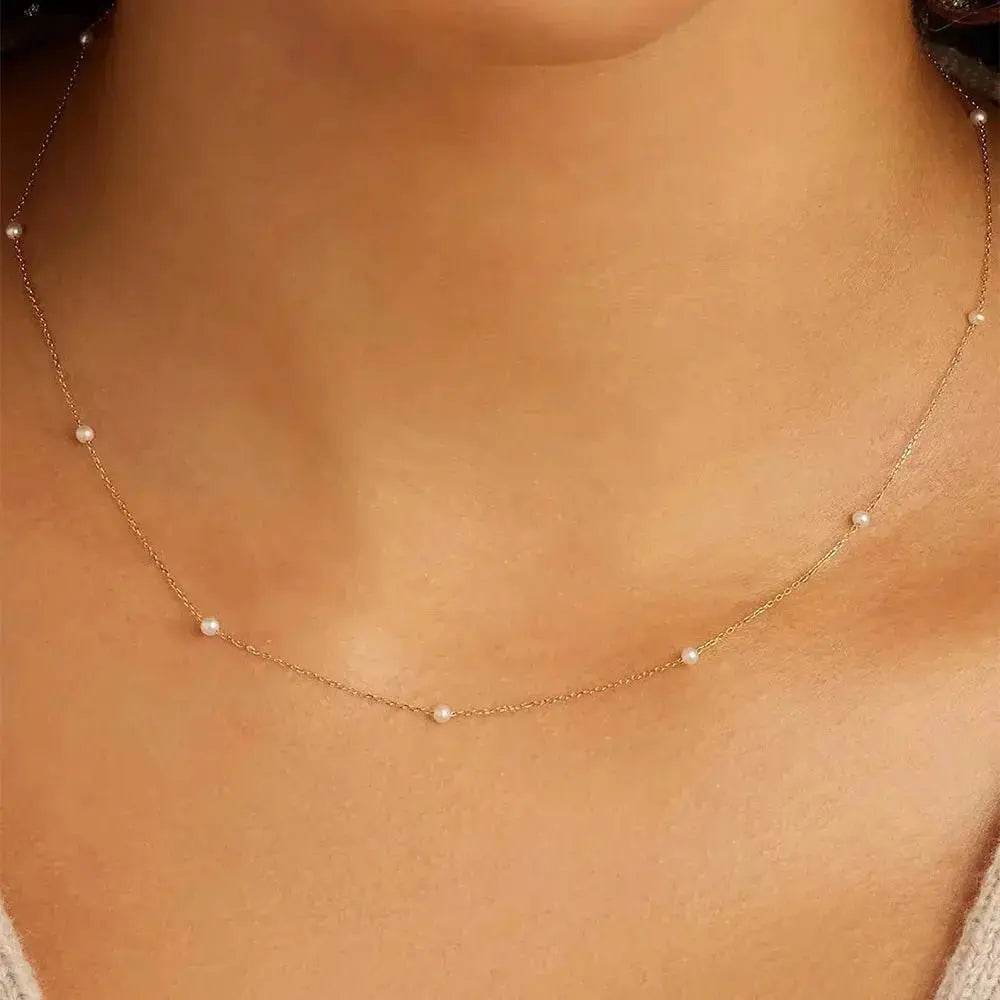 Minimalist pearl necklace shop name