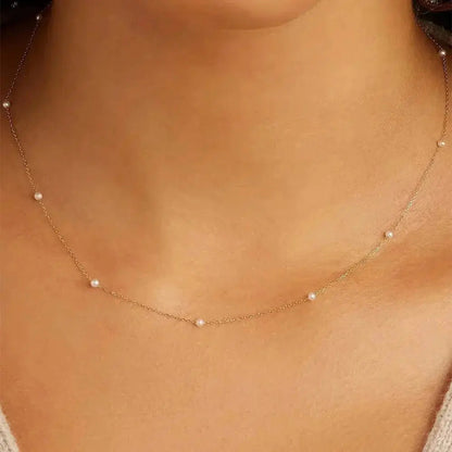 Minimalist pearl necklace shop name