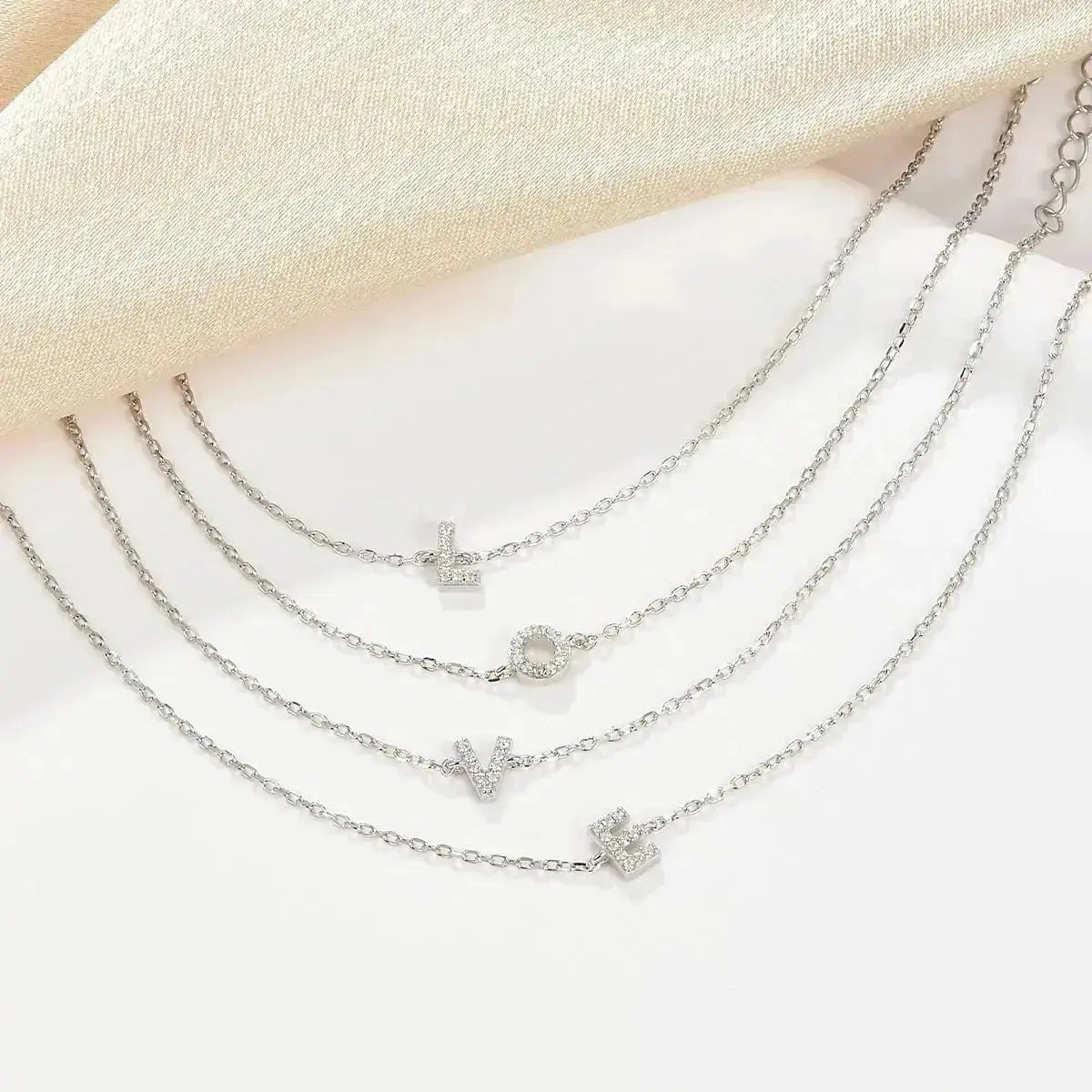 Silver Letter Charm Bracelet shop name