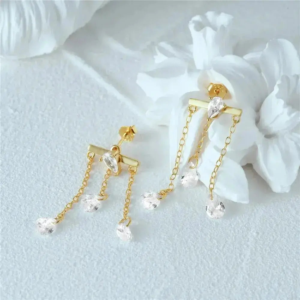 Three is Charm Gold Tassel Jacket Earrings shop name