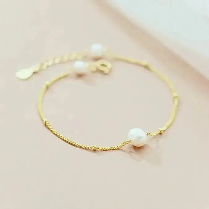 Three Pearl Vintage Vibe Gold Bracelet (small) shop name